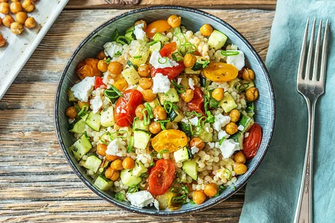 Mediterranean Quinoa Salad with Roasted Grape Tomatoes: A Symphony of Freshness and Flavor