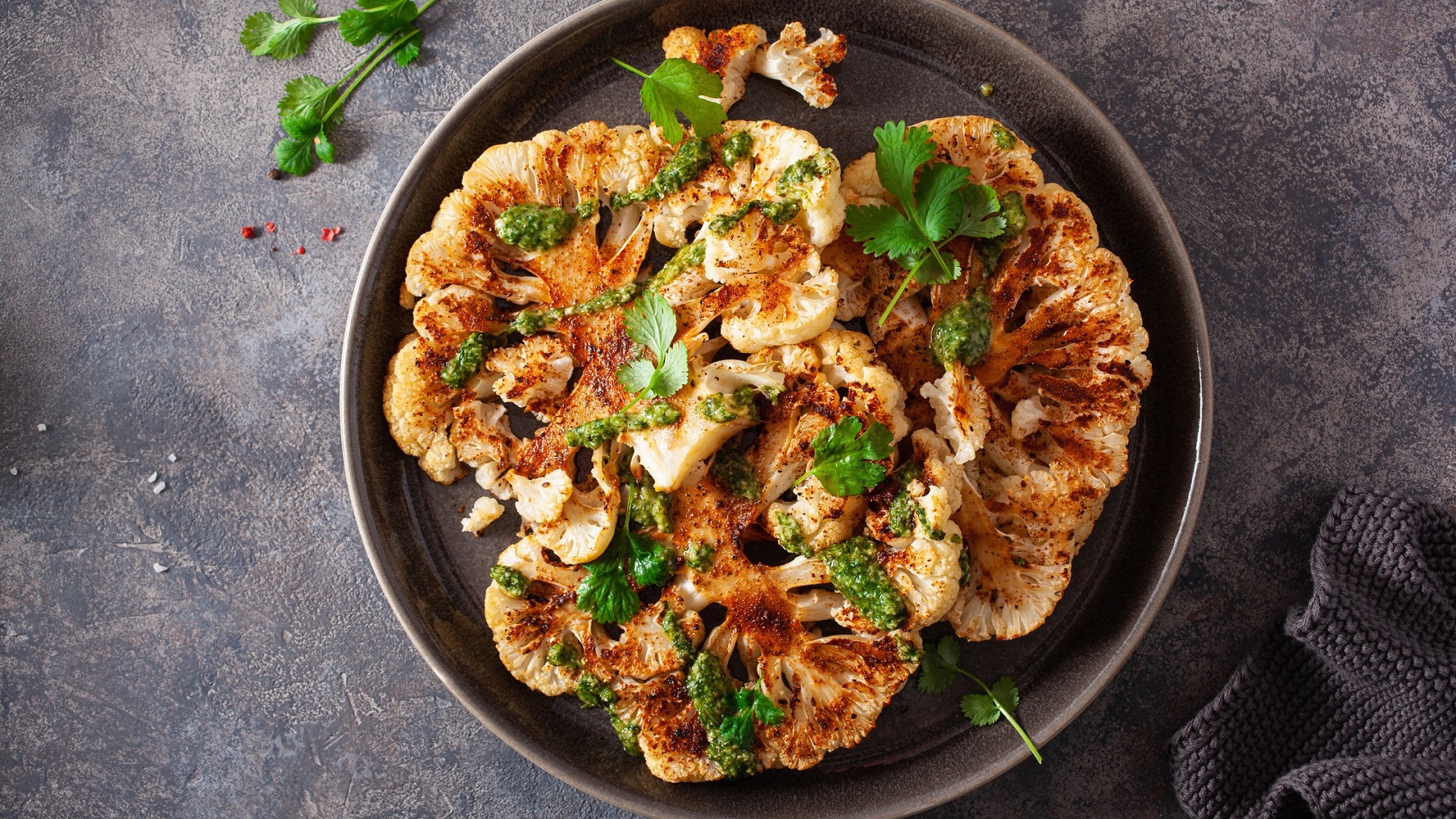 Spicy Roasted Cauliflower Steaks with Garlic Herb Sauce: A Culinary Ode to Plant-Based Innovation